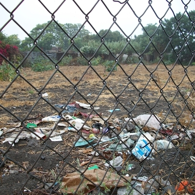 Faith Hope Veterans Park was a vacant lot with trash behind a chainlink fence