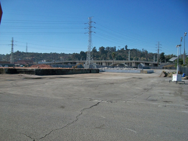 Albion Riverside park before construction was a paved vacant lot overlooking the L.A. River